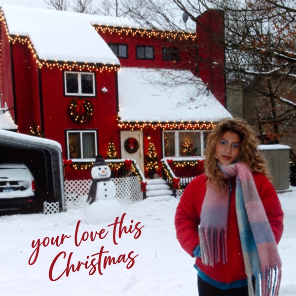 Your Love This Christmas cover: Mia Lailani outside a red house decorated for Christmas in the snow